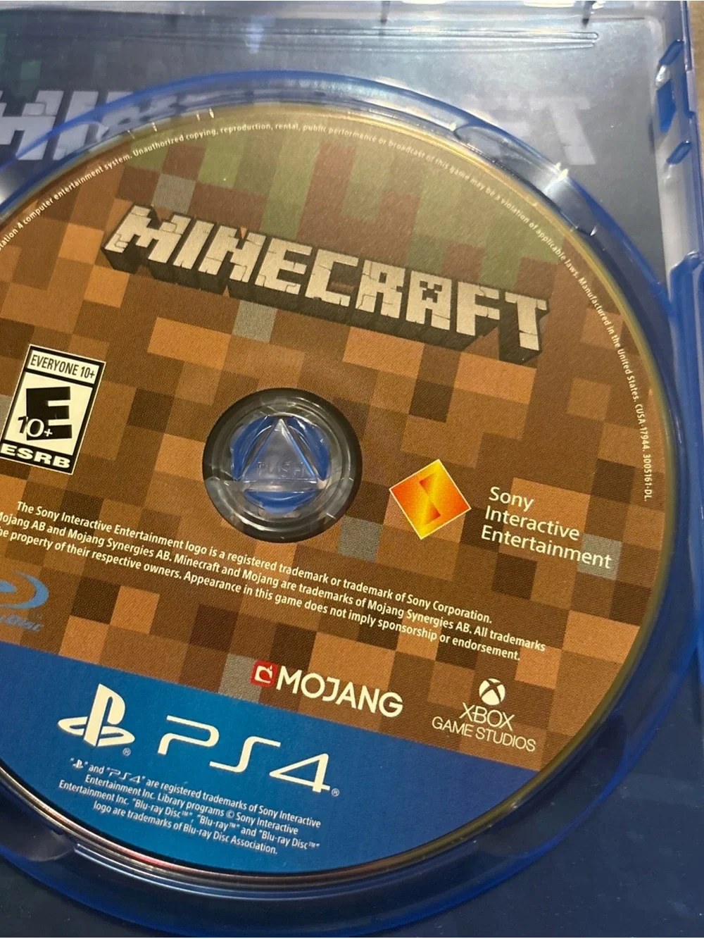 Mojang Minecraft (PS4) Video Game - Blue Case